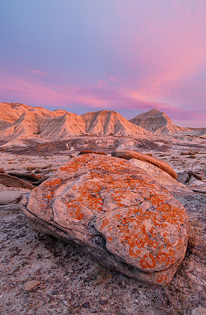 Landscape photograph of Toadstool Geologic Park in western Nebraska at sunrise with beautiful clouds.